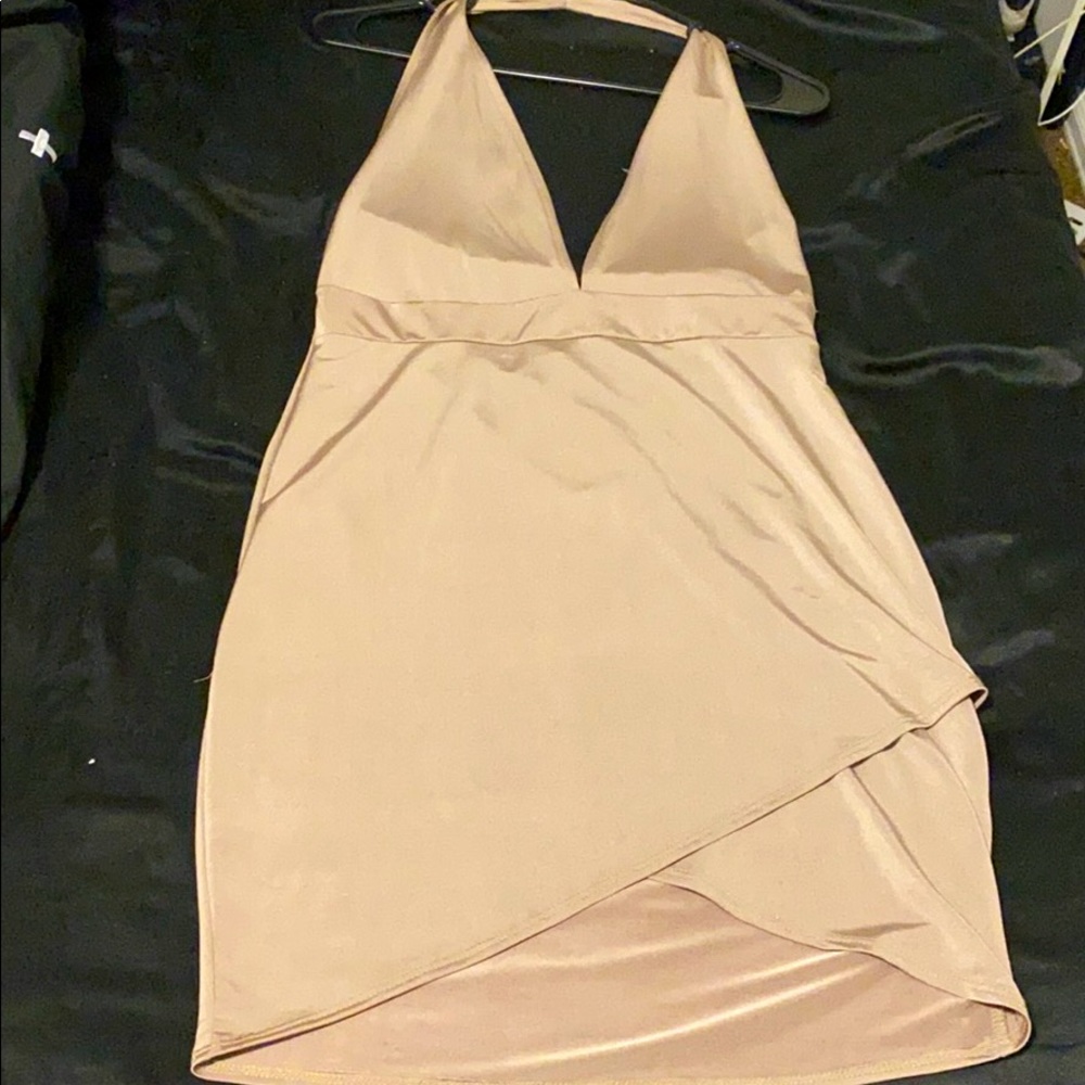 A bronze behind the neck strap backless dress